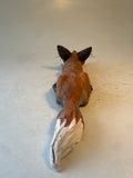 Crouching little fox