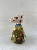 And there in a wood a piggy wig stood